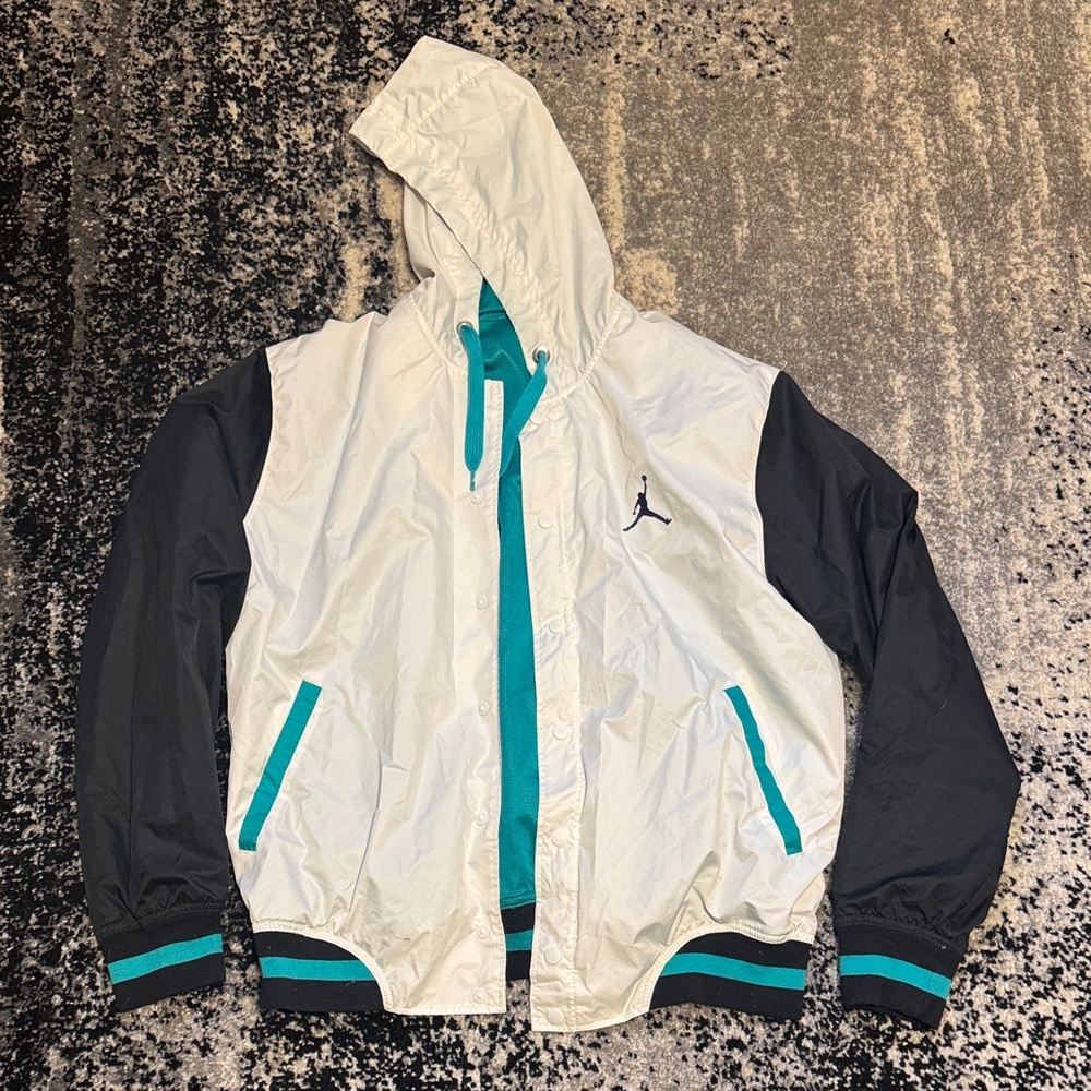 Jordan White and Black Rain Jacket with Teal Highlights